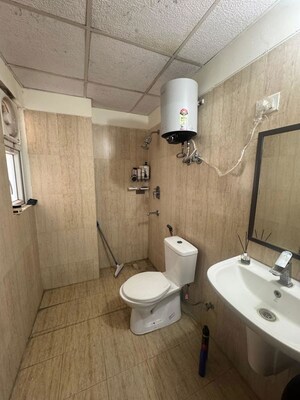 Bathroom in 2 BHK Apartment at Sunworld Vanalika, Sector 107 – for Rent
