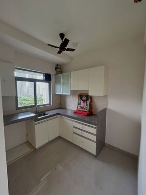 Kitchen in 2 BHK Apartment at Piramal Vaikunth, Balkum Pada – for Rent