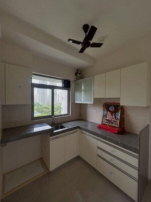 Kitchen in 2 BHK Apartment at Piramal Vaikunth, Balkum Pada – for Rent
