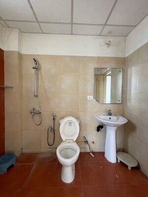 Bathroom in 2 BHK Apartment at Dhakoli – for Rent