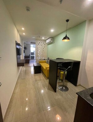 Living Room in Studio Apartment at JMD Suburbio, Sector 67 – for Rent