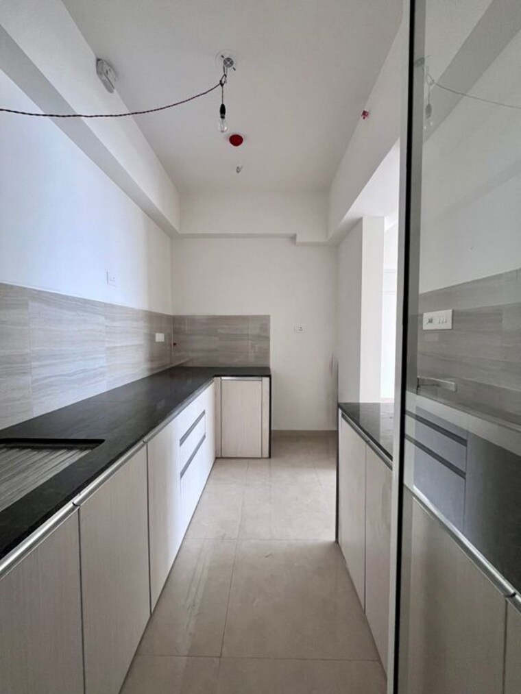 Kitchen, indiabulls-one-indiabulls 2 Bedroom 1000 Sq.Ft. Apartment In Pokhran Road No Two Thane 10673882
