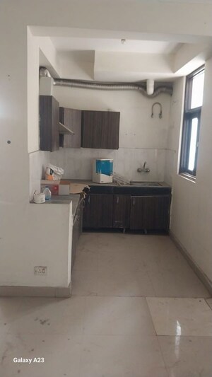 Kitchen in 2.5 BHK Apartment at Techman Moti Residency, Raj Nagar Extension – for Sale