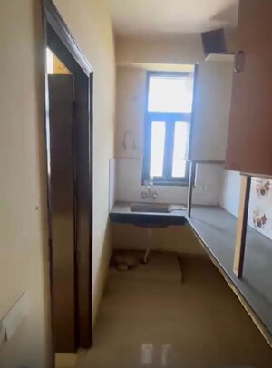 Kitchen in 1.5 BHK Apartment at Techman Moti Residency, Raj Nagar Extension – for Sale