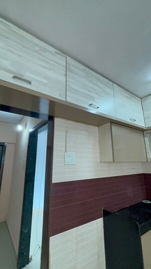 Kitchen in 2 BHK Apartment at Suraj Heritage, Owale – for Rent