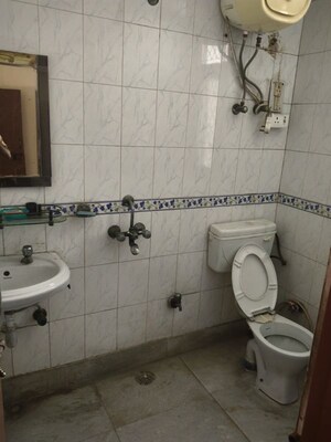 Bathroom in 2 BHK Apartment at Royal Towers Noida, Sector 61 – for Rent
