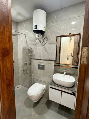 Bathroom in 4 BHK Builder Floor at Vatika India Next, Sector 82 – for Sale