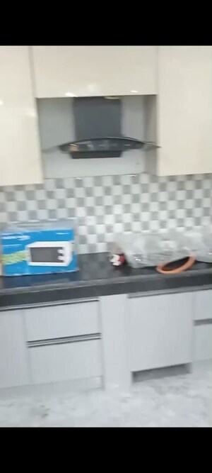 Kitchen in 3 BHK Apartment at Tulsiani Urban Woods, Sushant Golf City – for Rent
