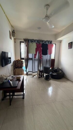 Living Room in 2 BHK Apartment at Lodha Crown Quality Homes, Majiwada – for Rent