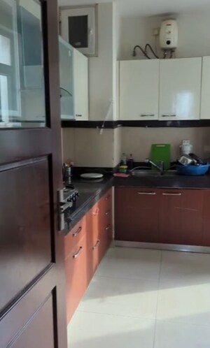 Kitchen in 2.5 BHK Apartment at Central Park Resorts, Sector 48 – for Rent