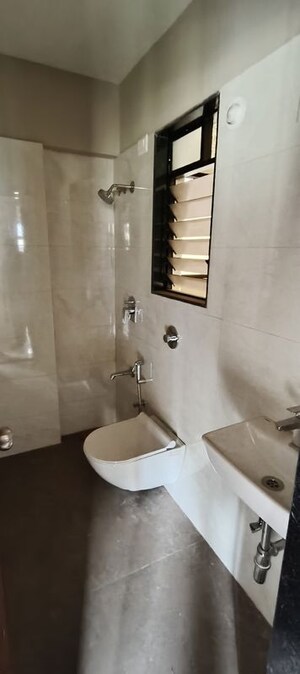 Bathroom in 1 BHK Apartment at Haware Intelligentia Vector, Kasarvadavali – for Rent