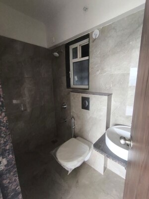 Bathroom in 1 BHK Apartment at Shraddha Vardaan, Bhandup West – for Rent
