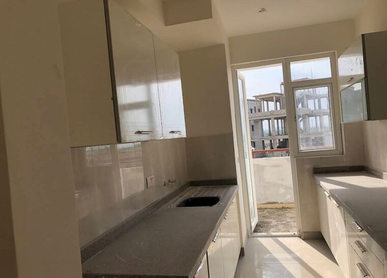 Kitchen, emaar-imperial-gardens 3 Bedroom 2025 Sq.Ft. Apartment In Sector 102 Gurgaon 10674144