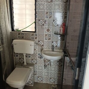 Bathroom in 1 BHK Apartment at Raunak Heights, Ghodbunder Road – for Rent