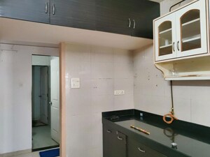 Kitchen in 2 BHK Apartment at Cosmos 27 Gbr, Kasarvadavali – for Rent