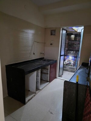 Kitchen in 2 BHK Apartment at Ravi Gaurav Excellency, Mira Road – for Sale