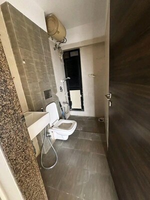 Bathroom in 2 BHK Apartment at MJ Shah Centrio, Govandi – for Sale