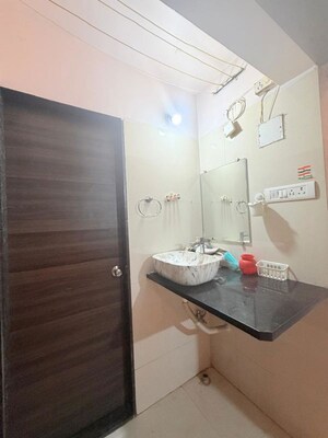 Bathroom in 1 BHK Apartment at Dosti Desire Joy, Brahmand – for Rent