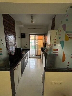 Kitchen in 2 BHK Apartment at Paras Dev Paradise Mira, Mira Road – for Sale
