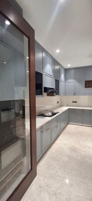 Kitchen in 5 BHK Builder Floor at Kailash Colony – for Rent