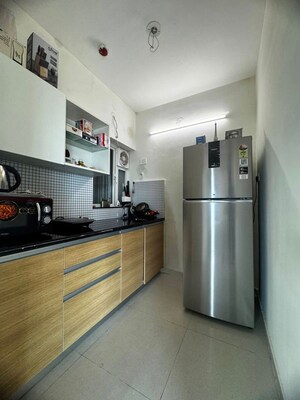 Kitchen in 2 BHK Apartment at Omkar Signet, Malad East – for Rent