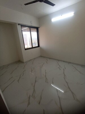 Bedroom in 2 BHK Apartment at Ram Pushpanjali Residency, Owale – for Rent