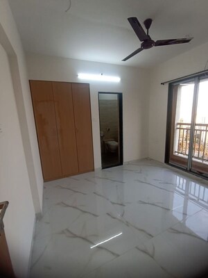Master Bedroom in 2 BHK Apartment at Ram Pushpanjali Residency, Owale – for Rent