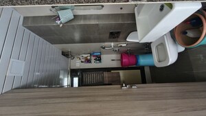 Bathroom in 1 BHK Apartment at Kanakia Rainforest, Andheri East – for Rent