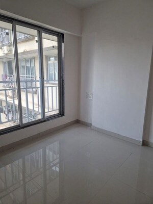 Room in 1 BHK Apartment at Neelyog Towers, Malad East – for Sale