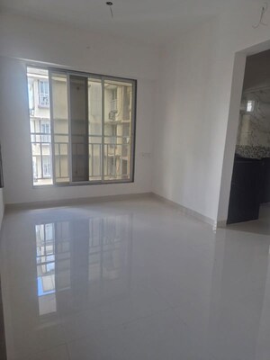 Room in 2 BHK Apartment at Vardhan Royale, Malad East – for Rent