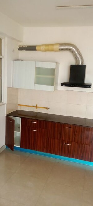 Kitchen in 2 BHK Apartment at Parker White Lily, Sector 8 – for Rent