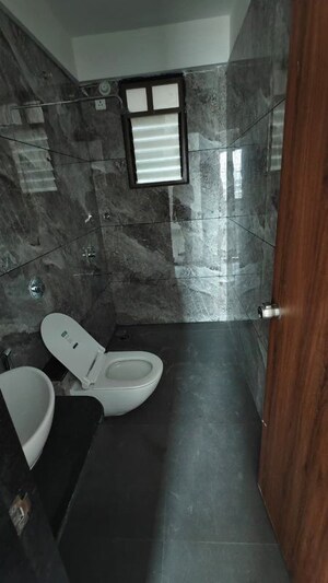 Bathroom in 3 BHK Apartment at Jhamtani Ace Abode, Kiwale – for Rent