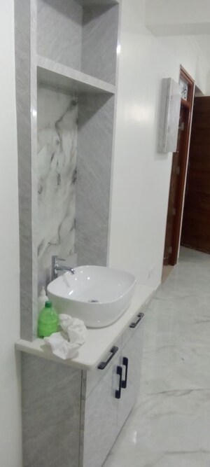 Bathroom in 4 BHK Apartment at Parker White Lily, Sector 8 – for Sale