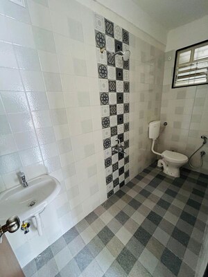 Bathroom in 2 BHK Apartment at Marne Maithili Square, Kiwale – for Rent