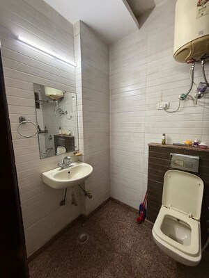 Bathroom in 2 BHK Builder Floor at Kalkaji – for Rent