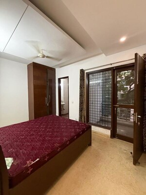 Bedroom in 2 BHK Builder Floor at Kalkaji – for Rent