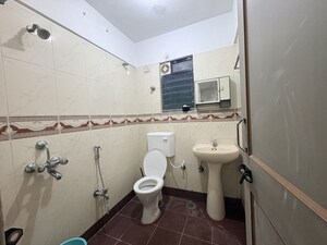Bathroom in 3 BHK Apartment at Sunshree Gold, Nibm Road – for Rent