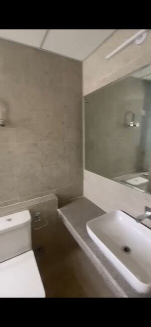 Bathroom in 2 BHK Apartment at Eldeco Live By The Greens, Sector 150 – for Rent