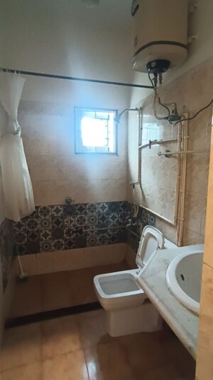 Bathroom in 3 BHK Apartment at Lakshmi Nilayam Indiranagar, Indiranagar – for Rent