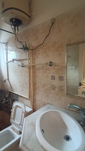 Bathroom in 3 BHK Apartment at Lakshmi Nilayam Indiranagar, Indiranagar – for Rent