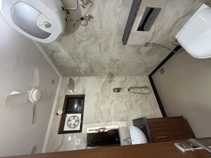 Bathroom in 3 BHK Builder Floor at New Rajinder Nagar – for Sale