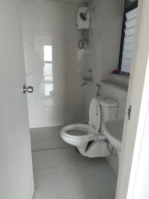 Bathroom in 2 BHK Apartment at Runwal Gardens, Dombivli East – for Rent