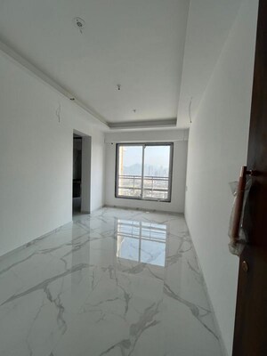 Living Room in 1 BHK Apartment at Pramanik Walchand Paradise, Mira Road – for Sale
