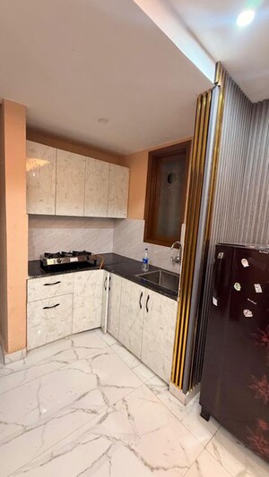 Kitchen in 2 BHK Apartment at Advetaya Smart Homes, Sector 104 – for Rent