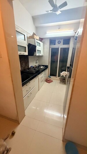 Kitchen in 1.5 BHK Apartment at Sunshine Samriddhi Garden, Bhandup West – for Rent