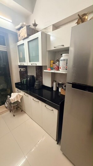 Kitchen in 1.5 BHK Apartment at Sunshine Samriddhi Garden, Bhandup West – for Rent