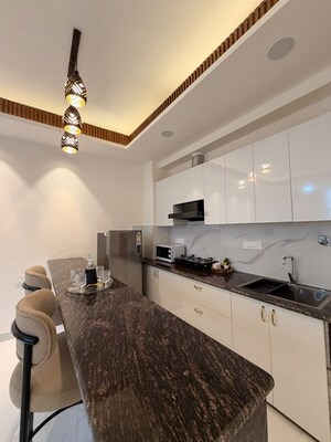 Team Area in 3.5 BHK Apartment at DLF Silver Oaks, Sector 26 – for Rent