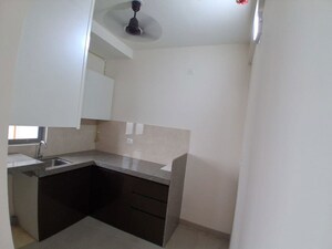 Kitchen in 1 BHK Apartment at Piramal Vaikunth, Balkum Pada – for Rent