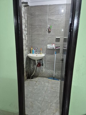 Bathroom in 3 BHK Builder Floor at Maan Heights, Gaur City 1 – for Rent