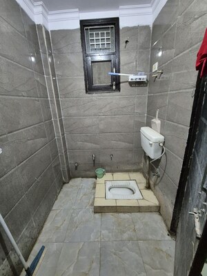 Bathroom in 3 BHK Builder Floor at Maan Heights, Gaur City 1 – for Rent